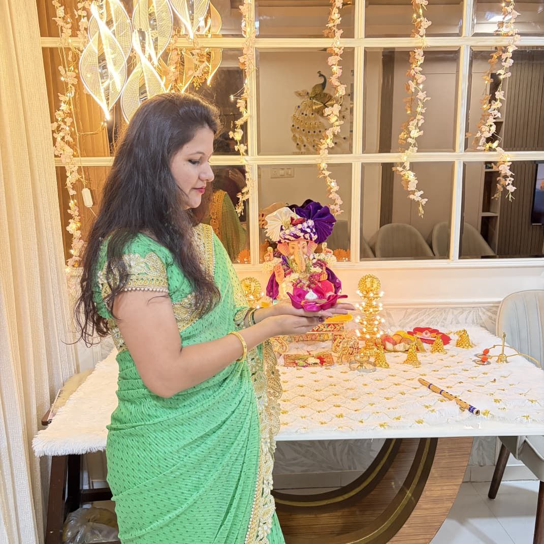 Welcoming Bappa with Lotus and Warm Lights